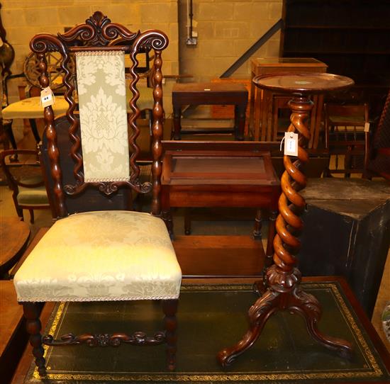 A Victorian carved walnut prie dieu chair and a walnut candle stand on barleytwist column